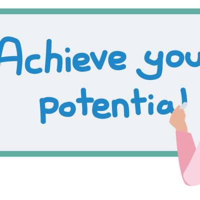 A teacher writing on a whiteboard